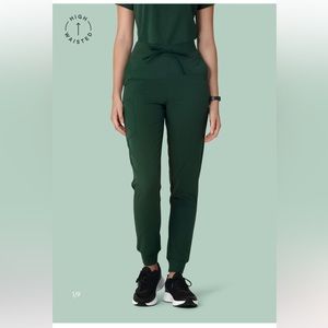 Brand new with tags Mandala jogger scrub bottoms. XS midnight green color